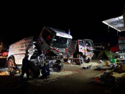 Mechanics carry out thorough inspections ahead of the marathon stage. 