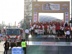The Car 1 crew and staff members on the podium. 