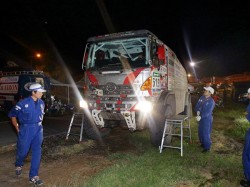 Mechanics meet Car 2 as it arrives at the bivouac.