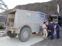 Damage on Car 2 is minimal despite tipping over. 