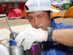 Mechanic Hironaga Hayashi replaces a shock absorber. 